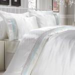 Pul nakışlı krem Merinos saten nevresim takımı modeli